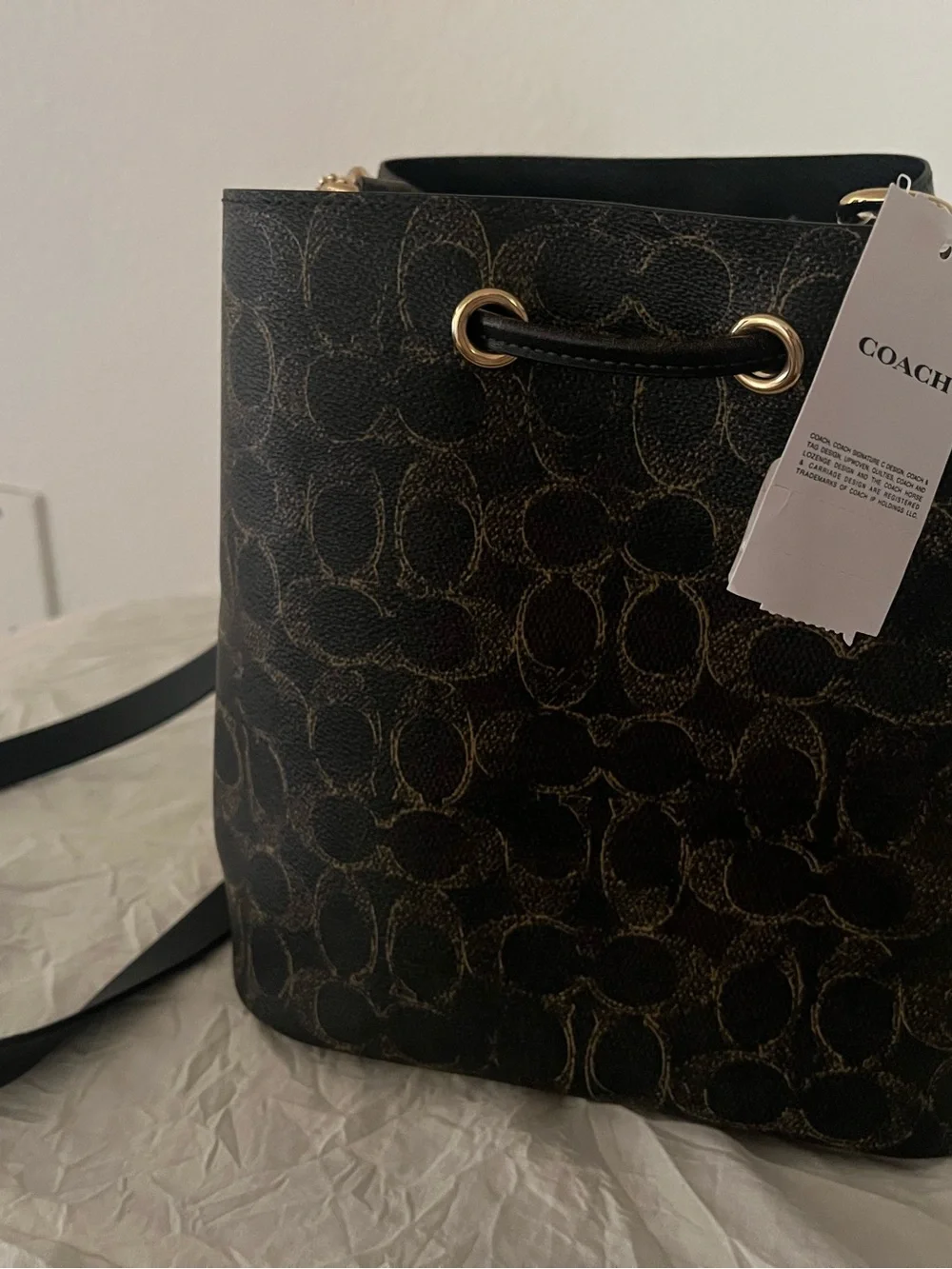 Rowan Bucket Bag in Loved Signature Coated Canvas